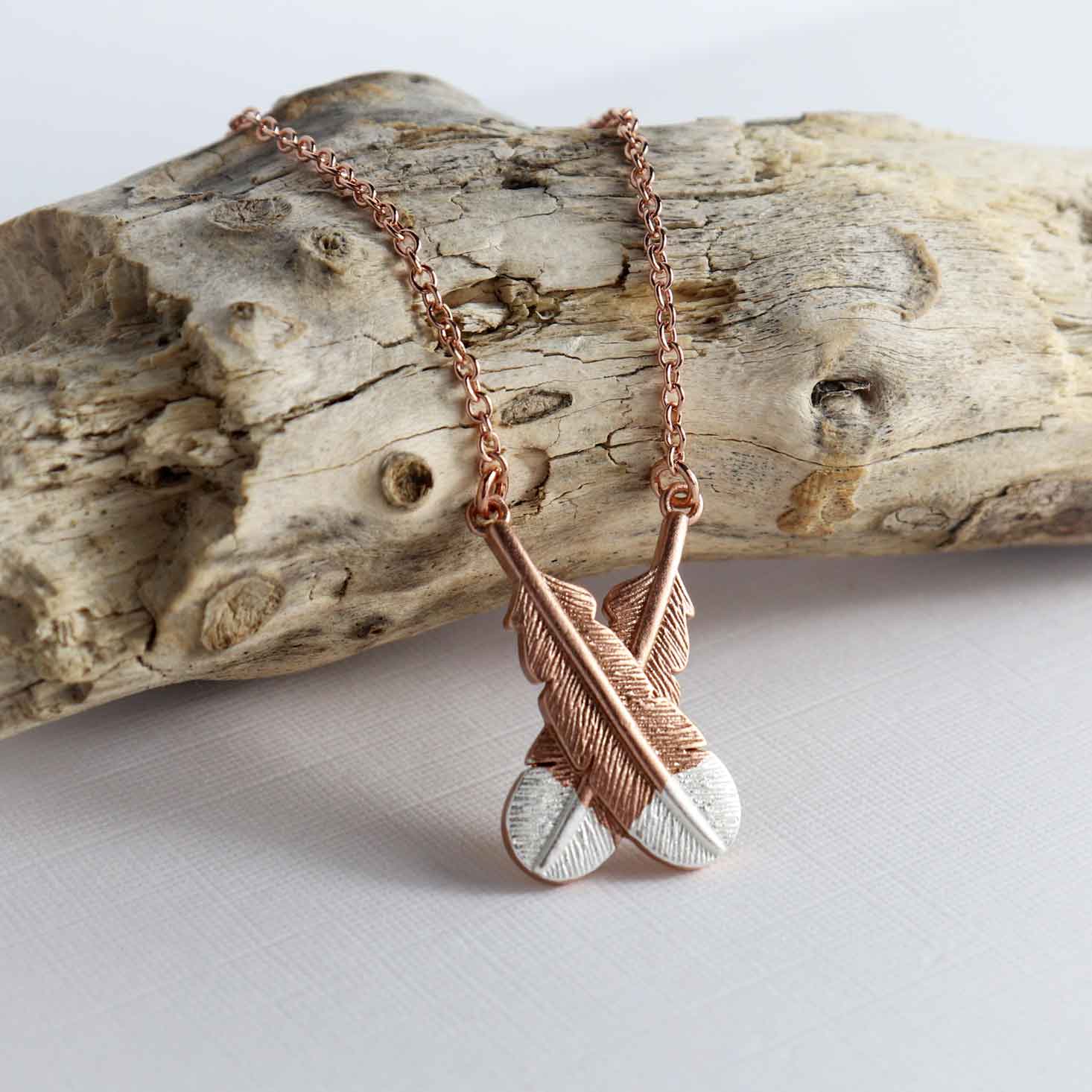 Crossed Huia Feather Necklace Rose Gold